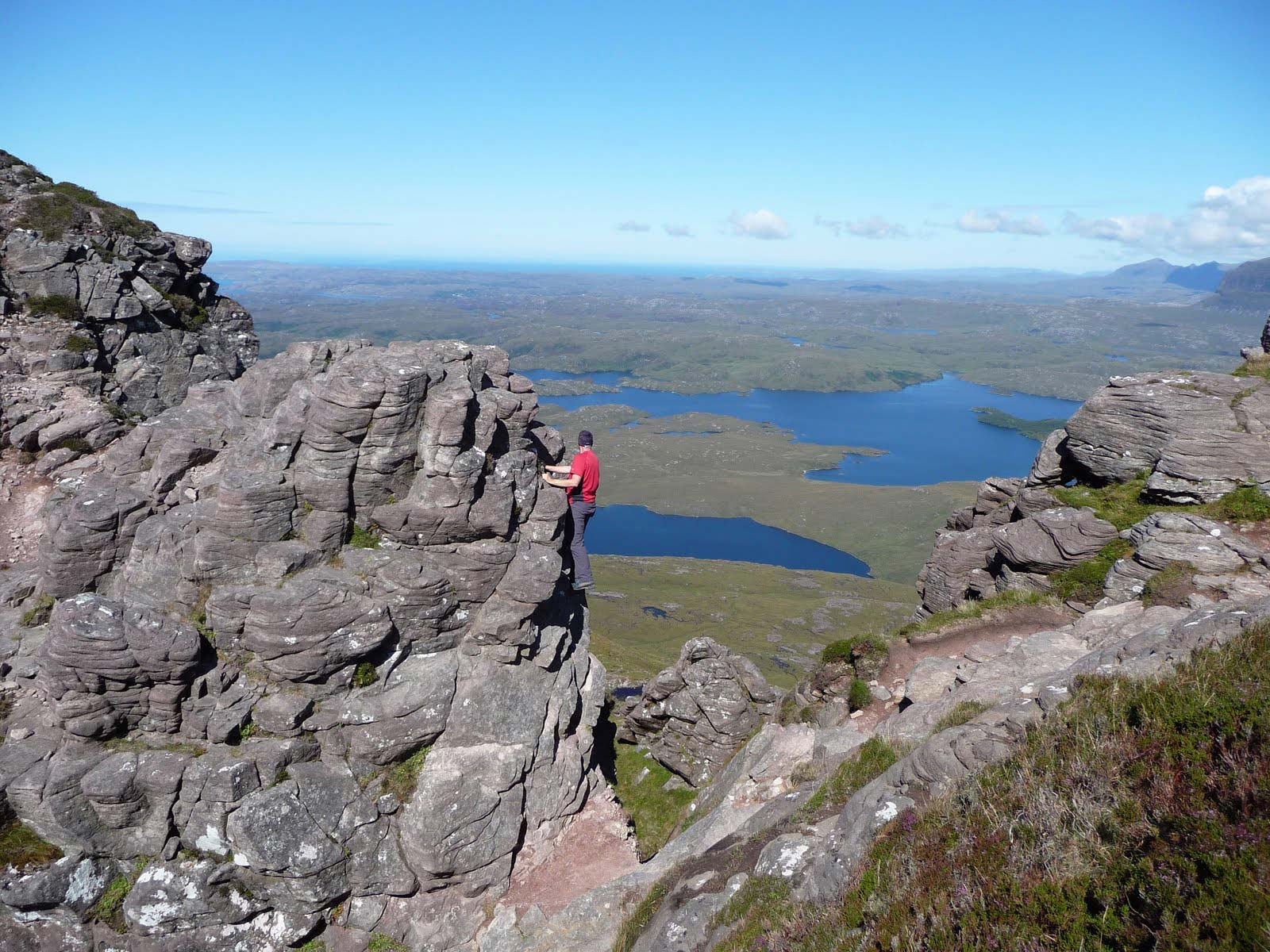 Rock scrambling in Ullapool in the Scottish Highlands