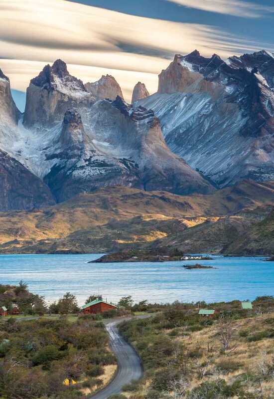 A view of the stunning mountains in Patagonia with a lake in the foreground