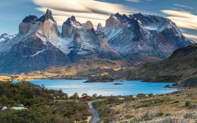 A view of the stunning mountains in Patagonia with a lake in the foreground