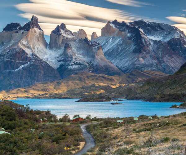 A view of the stunning mountains in Patagonia with a lake in the foreground