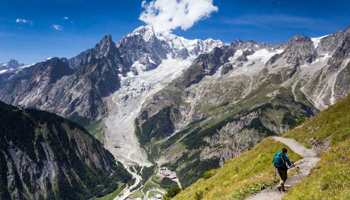 A hiker on the trail on the Tour du Mont Blanc