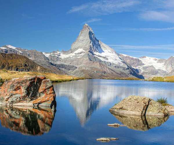 A view of a mountain lake infront of the Matterhorn